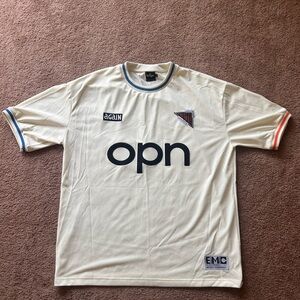 OPN musical artist jersey 
rare merch from the artist, oneohtrix point never.